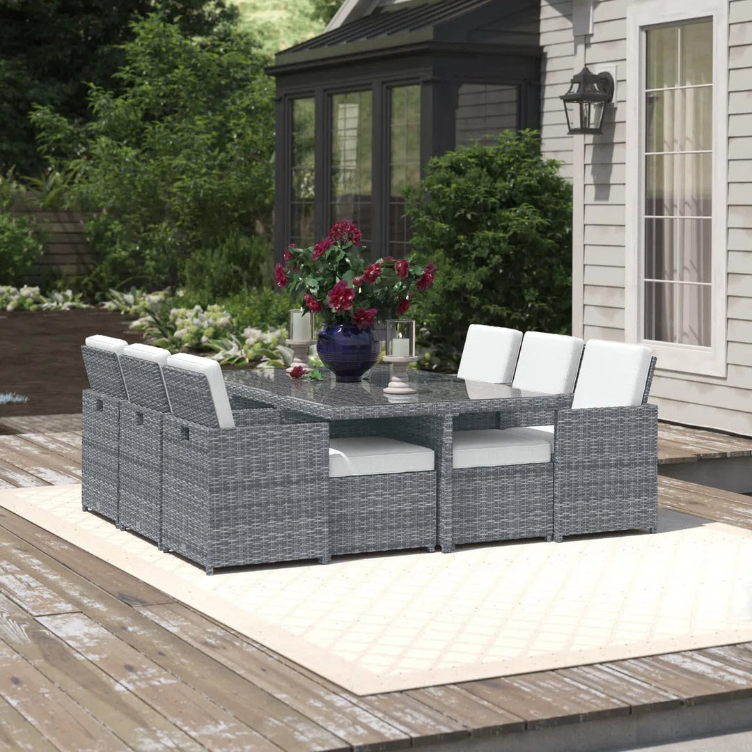 Three Posts Guynn Rectangular 10-Person Dining Set with Cushions